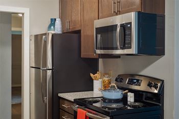 Stainless Steel Kitchen Appliances At Villages on McKnight Apartments In North St Paul, MN